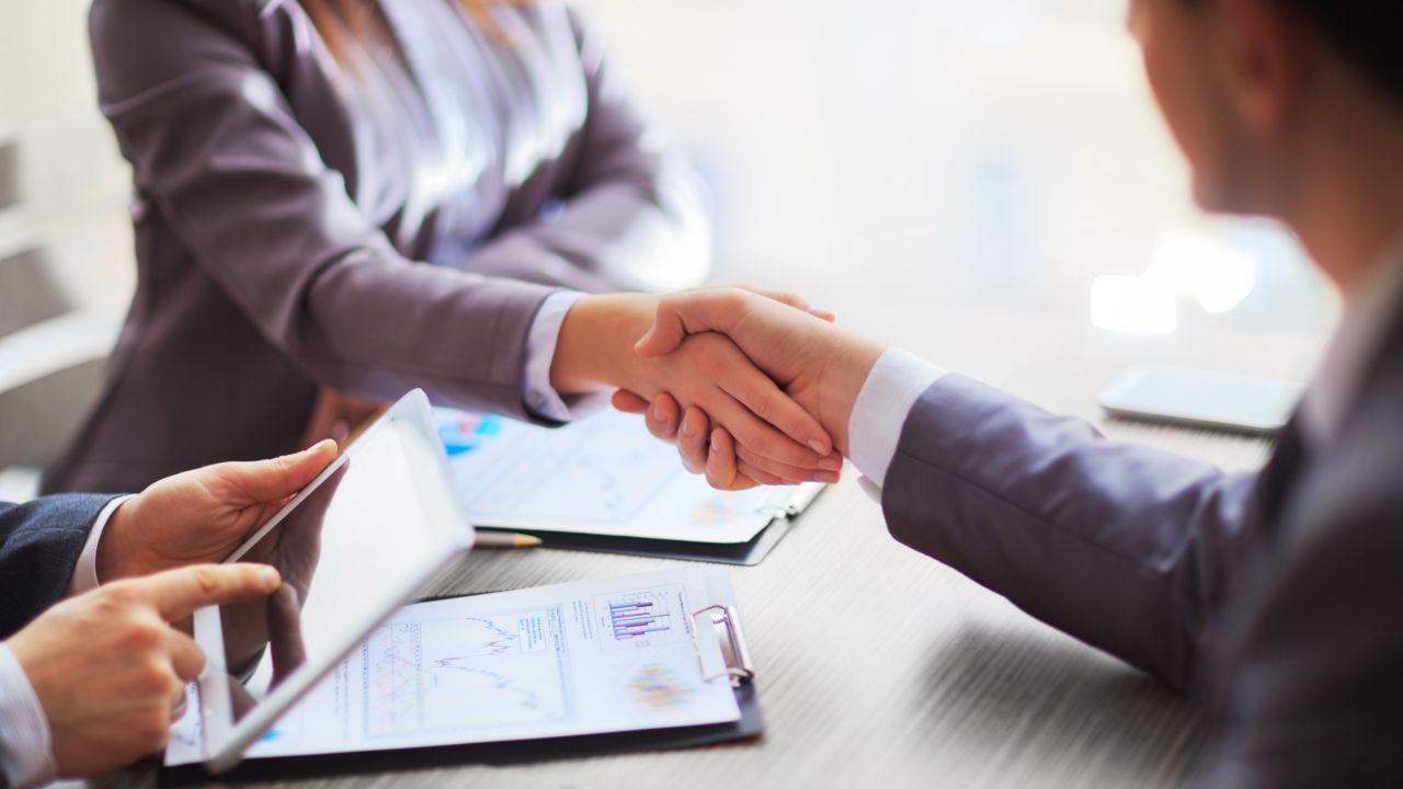 Two people shaking hands