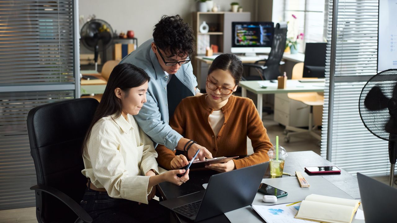 Group Of Business People Helping Each Other