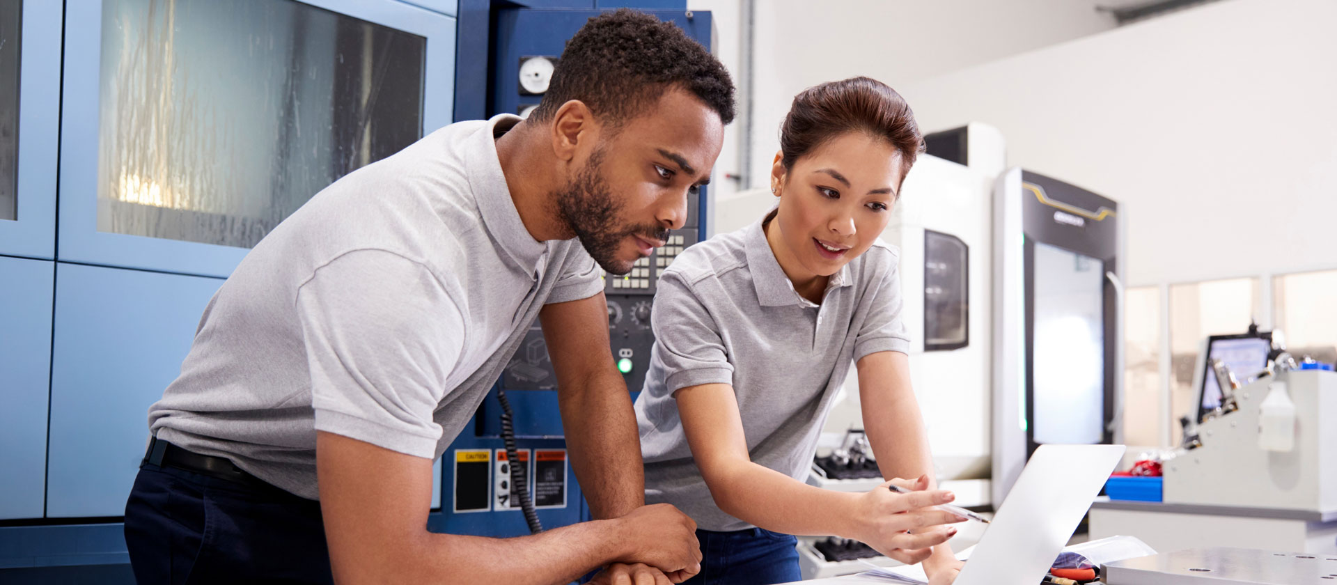 Two-engineers-at-work-on-products-banner